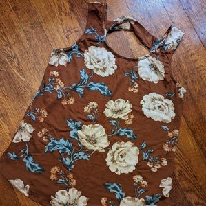 Brown tank with flowers